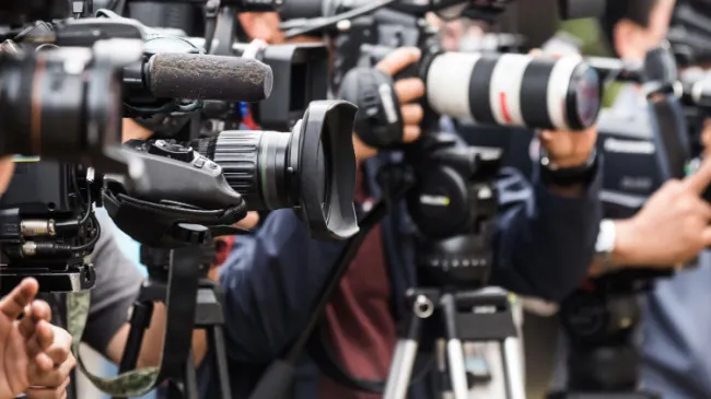 press cameras